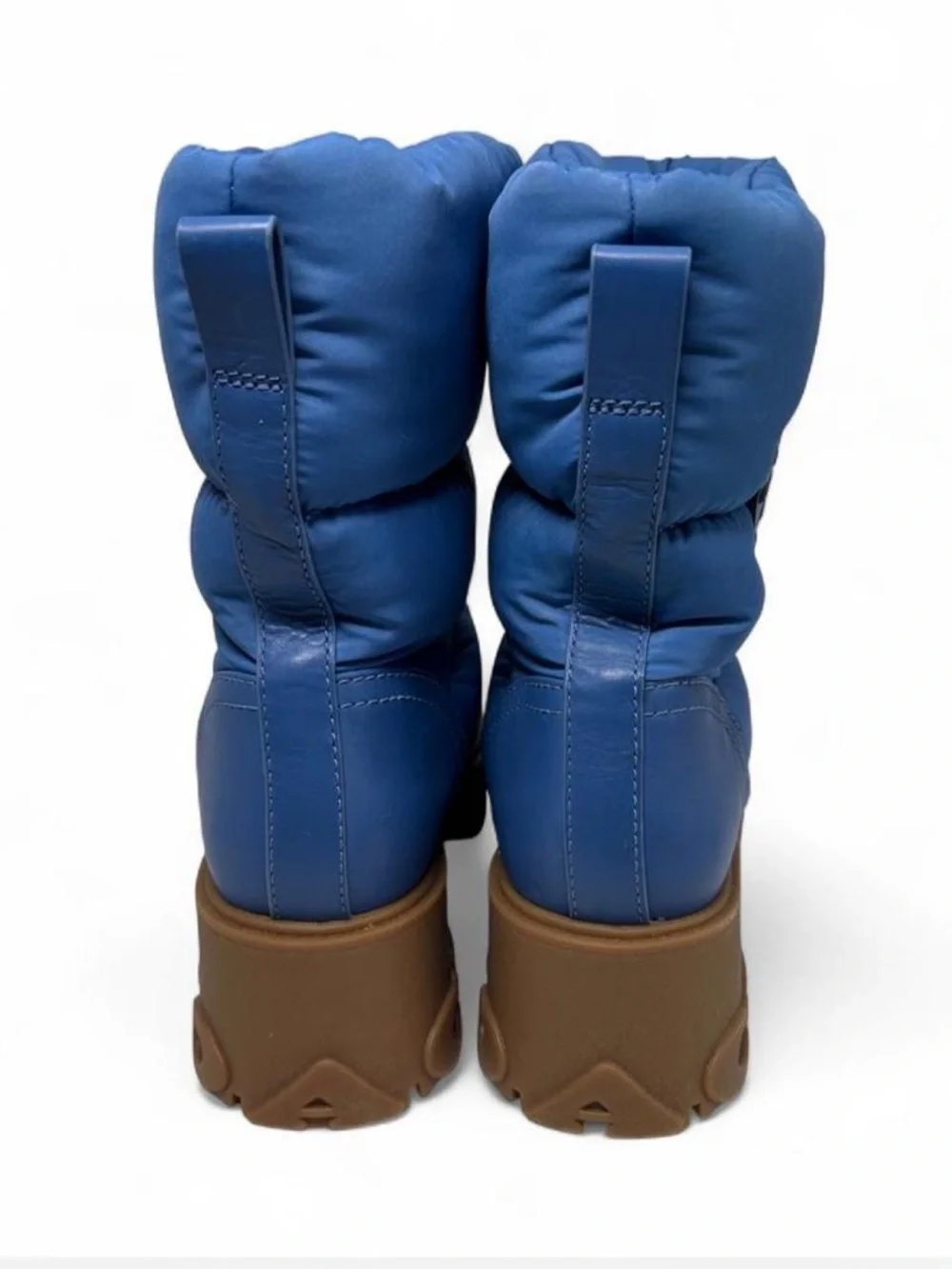 Coach Rya Boots inSky Blue. Quilted puffer-style nylon, leather upper.